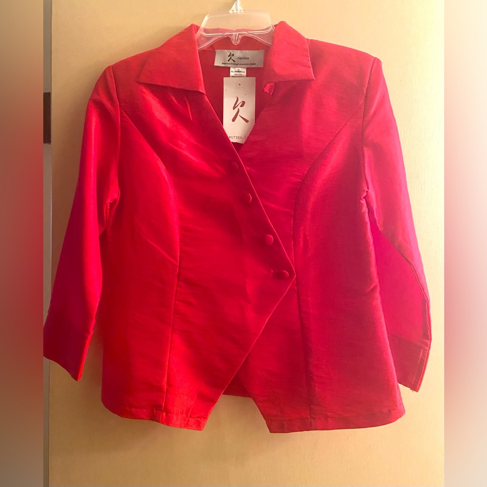 Beautiful silk top! Hand woven and naturally dyed. Definitely a work of art.